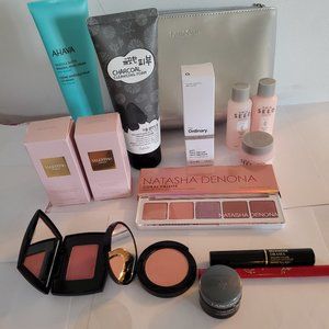 Makeup and skin care lot in silver bag